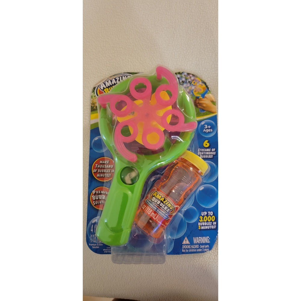Amazing Bubbles Blizzard hand held bubbles machine with bubbles NWT Pink & Green